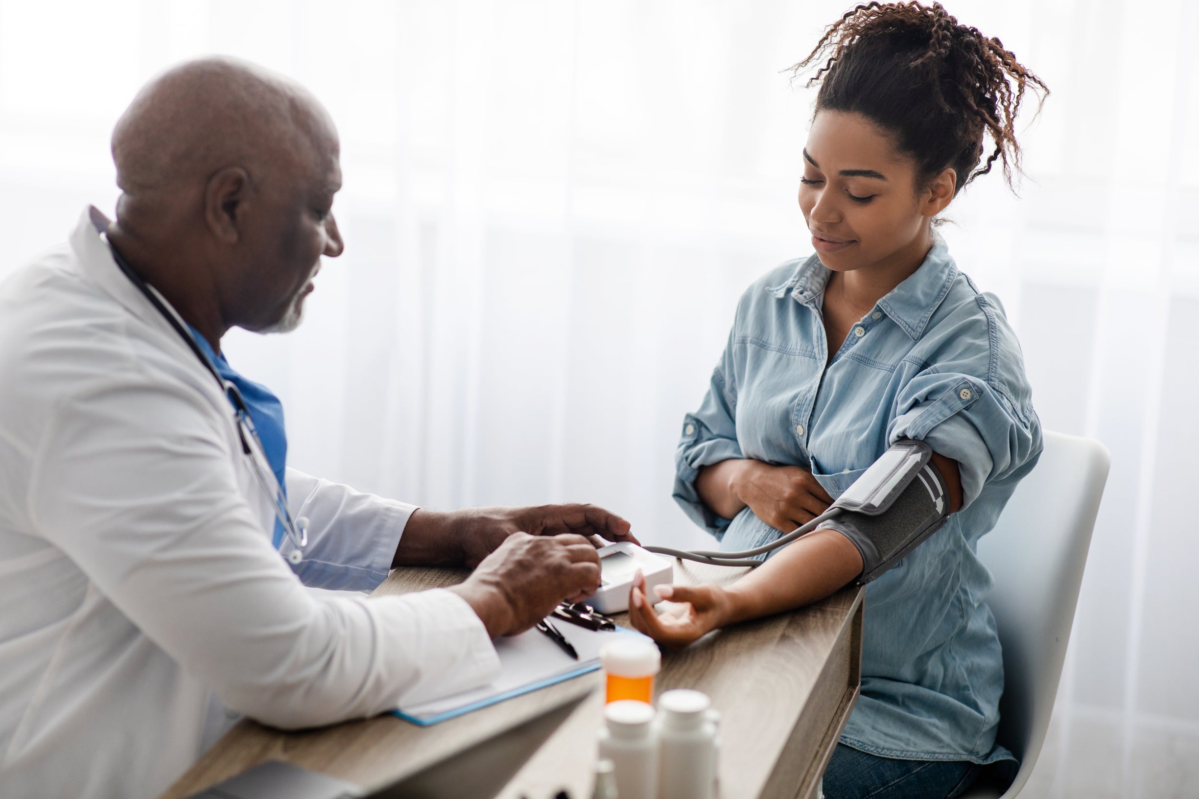 Image of physician with patient 
