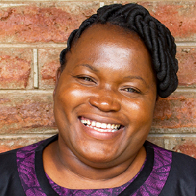 Headshot of Dr. Queen Dube