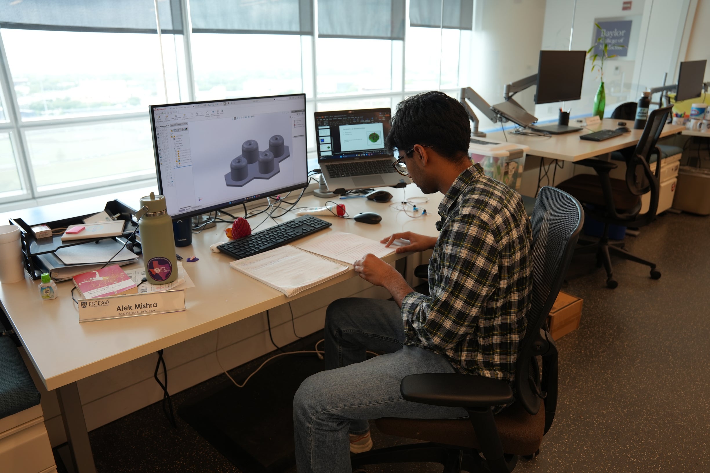 Photo: Alek Mishra designing a 3D model of cervical molds