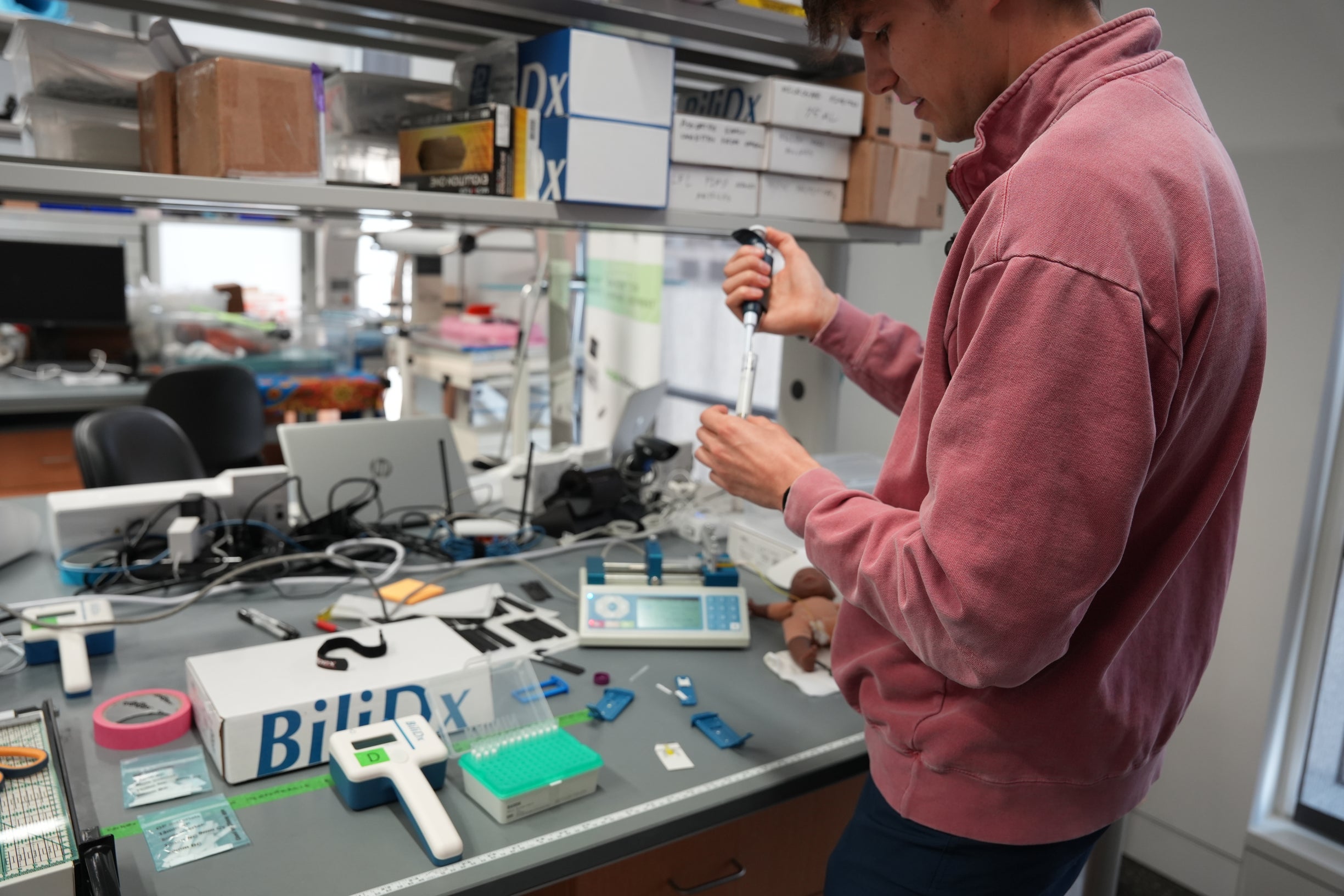 Photo: Benjamin working on the BiliDx cartiradge redesign